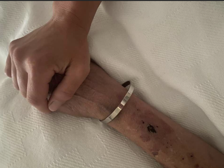 You held my hand on the way in to this world, I held your on the way out